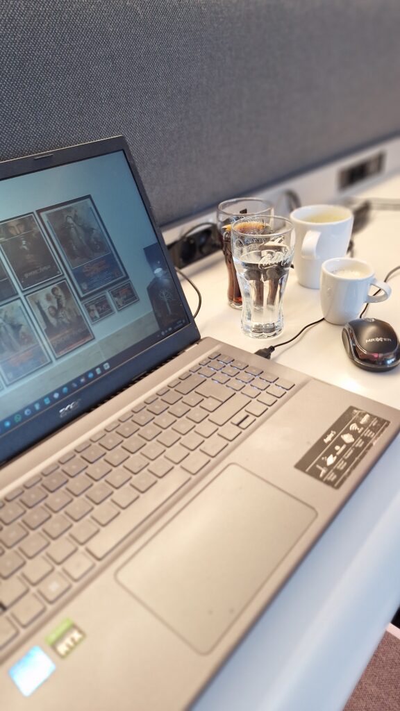 My usual set at the lounge - soup, coke, water, espresso macchiato